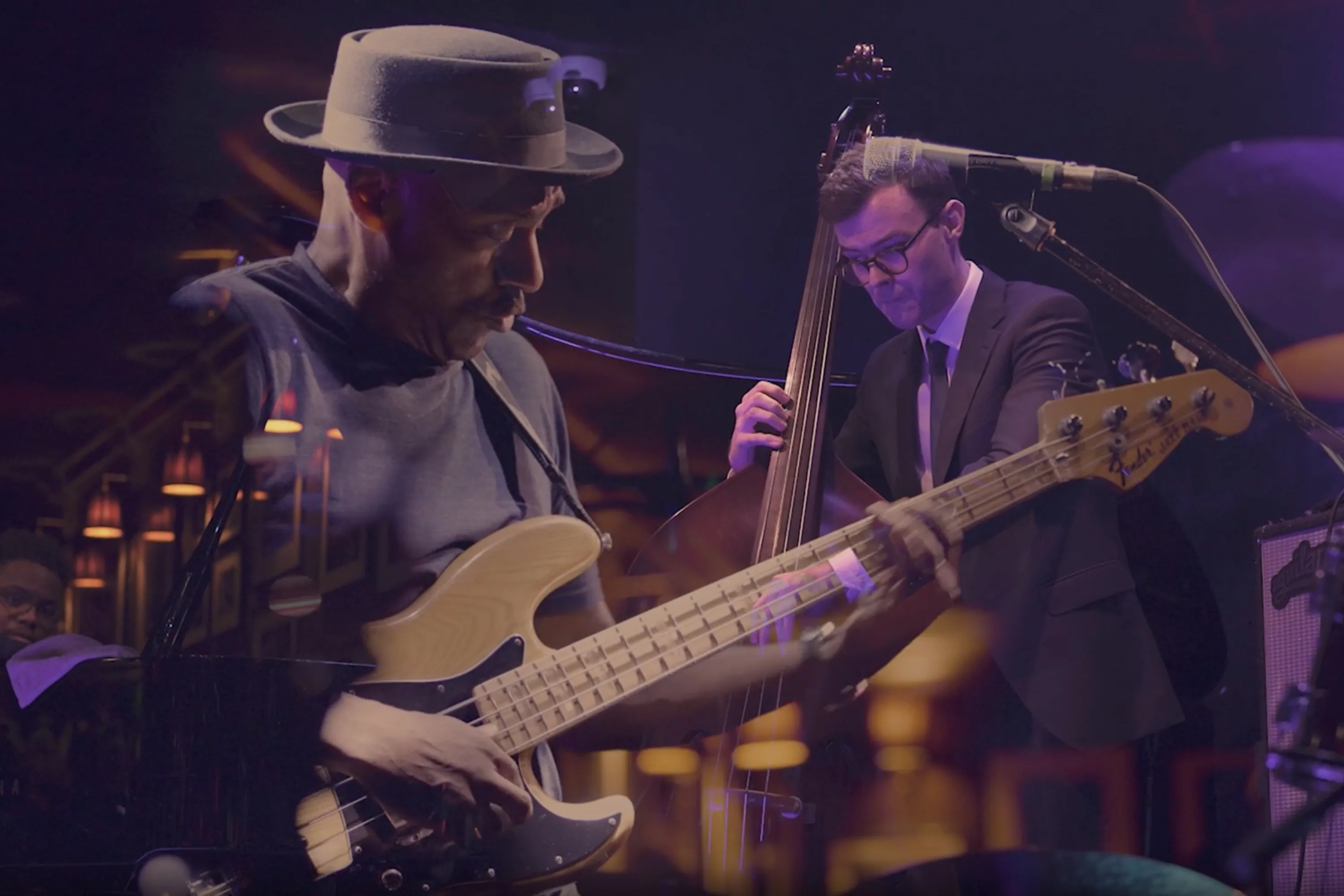 Montage of musicians playing bass guitar, double bass and piano