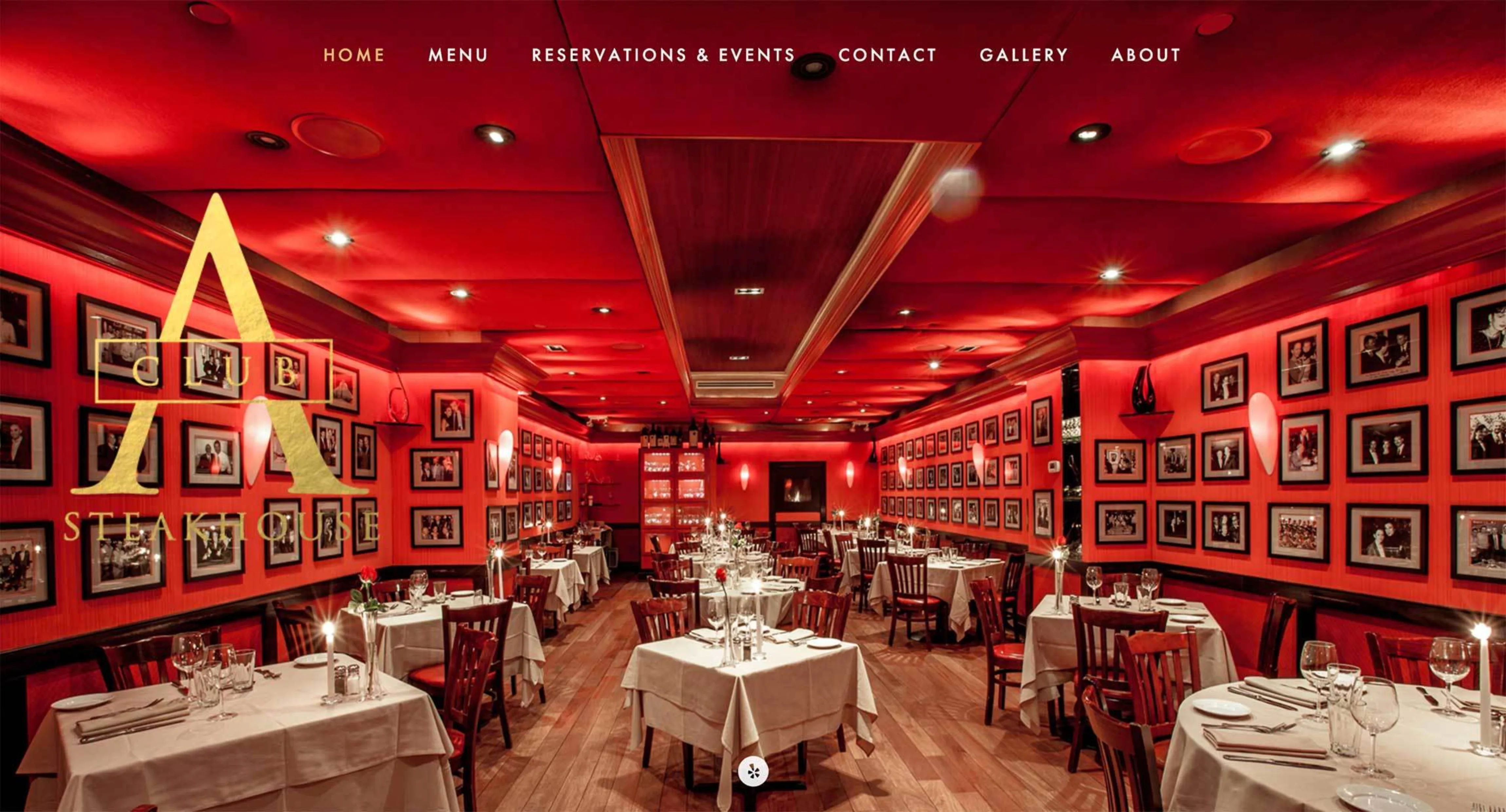 Screenshot from Club A Steakhouse showing a sumptuous interior restaurant scene ands understated graphic elements